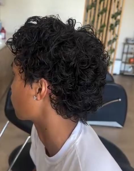 Defined dark-brown curls from a fresh perm on short hair, side view, Hair Palette Beauty Salon, El Cajon
