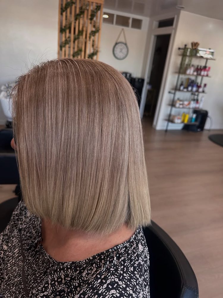 Sleek ash-blonde bob with a sharp, blunt line, side view, Hair Palette Beauty Salon, El Cajon