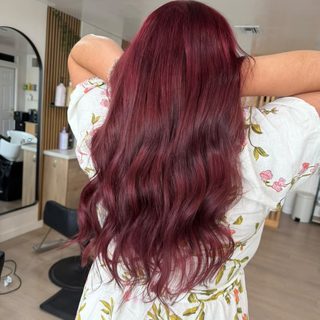 Deep cherry-burgundy hair color by Hair Palette Beauty Salon