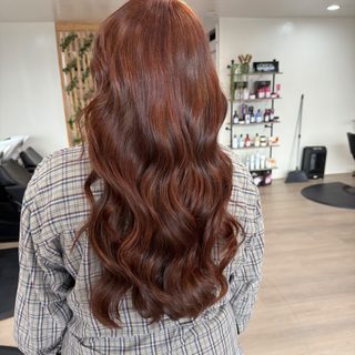 Rich auburn-copper waves by Hair Palette Beauty Salon
